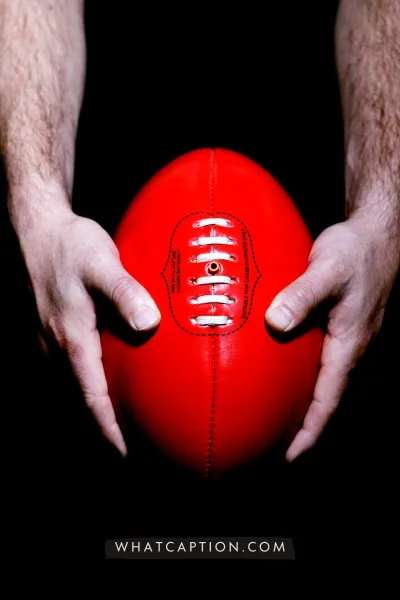 Australian Rules Football Caption